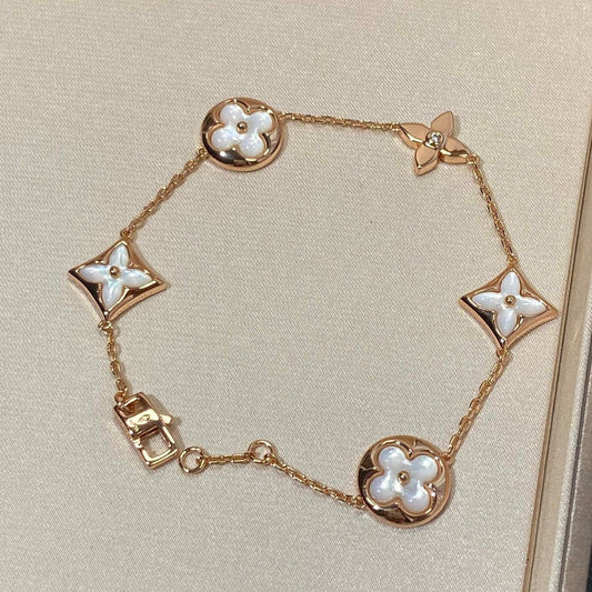 [Royal Jewelry]STAR AND SUN 5 MOTIF MOP PINK GOLD BRACELET